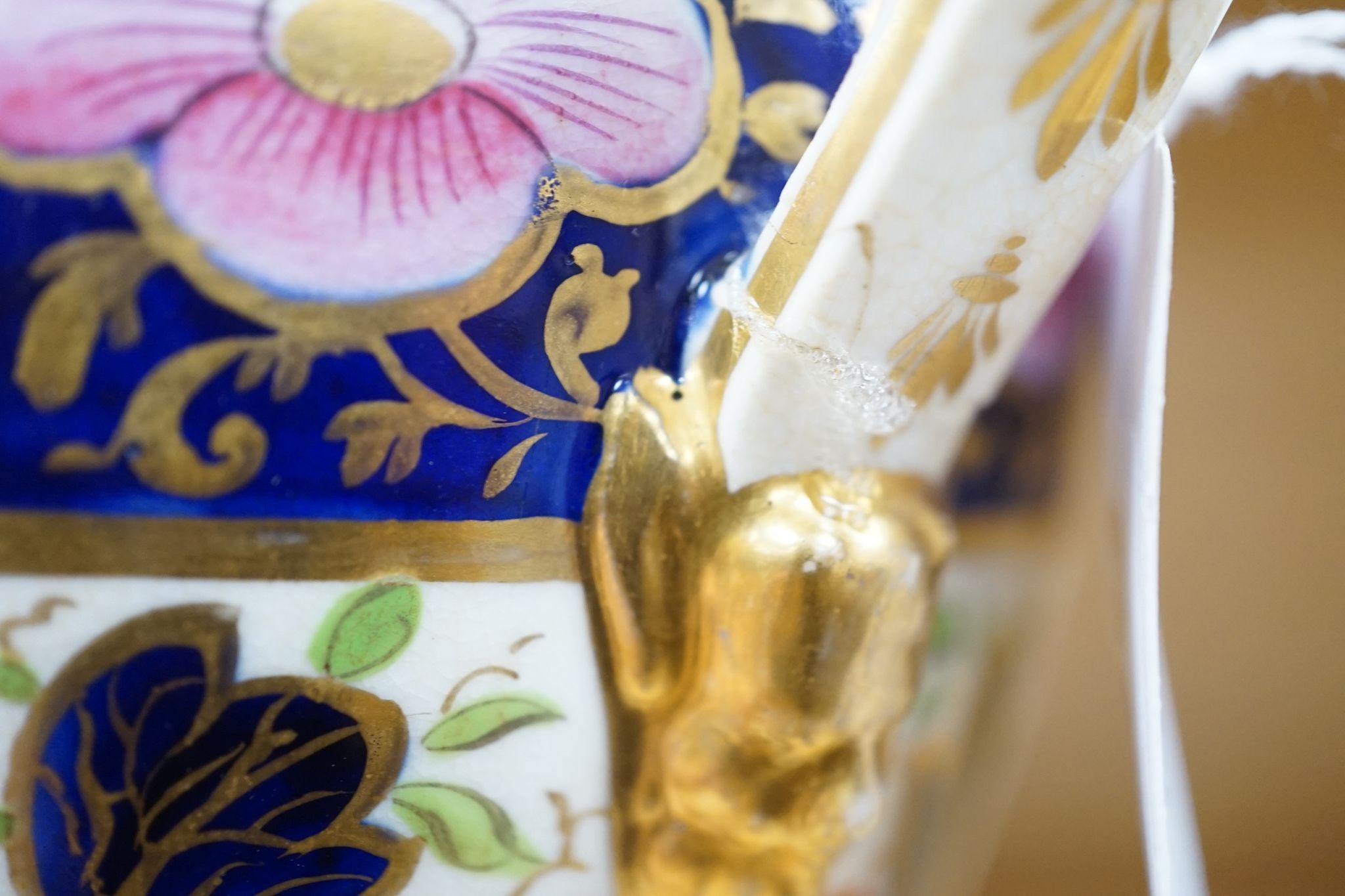 An early 19th century Derby garniture of Imari style vases 29cm